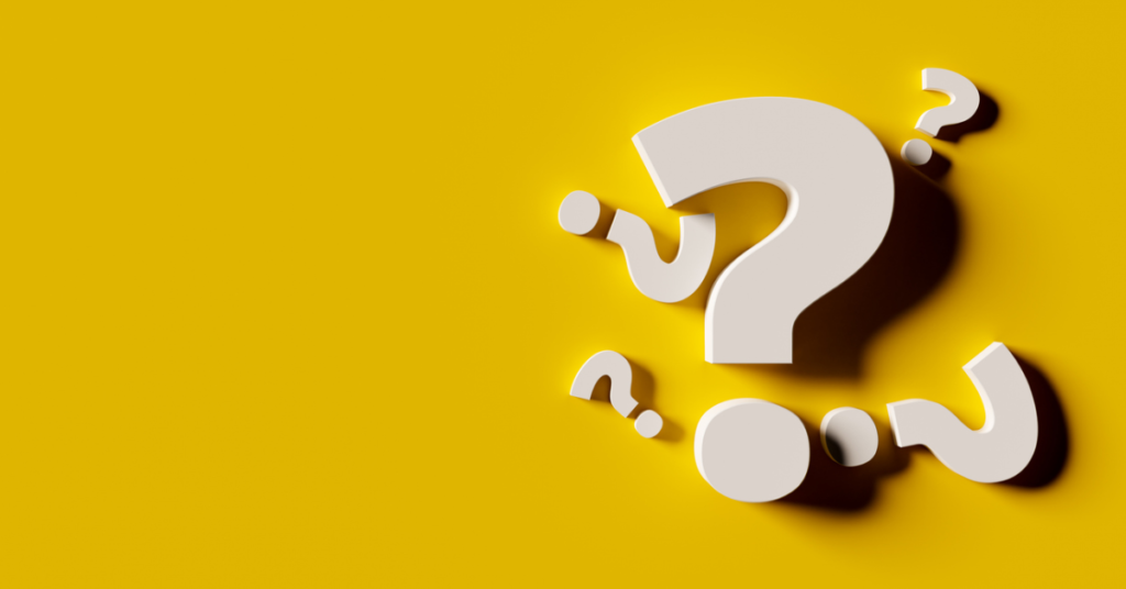 An image of series of question marks on a yellow background