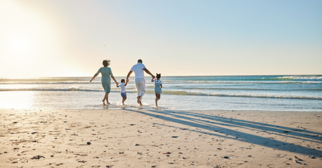 A photo of a family on a beach